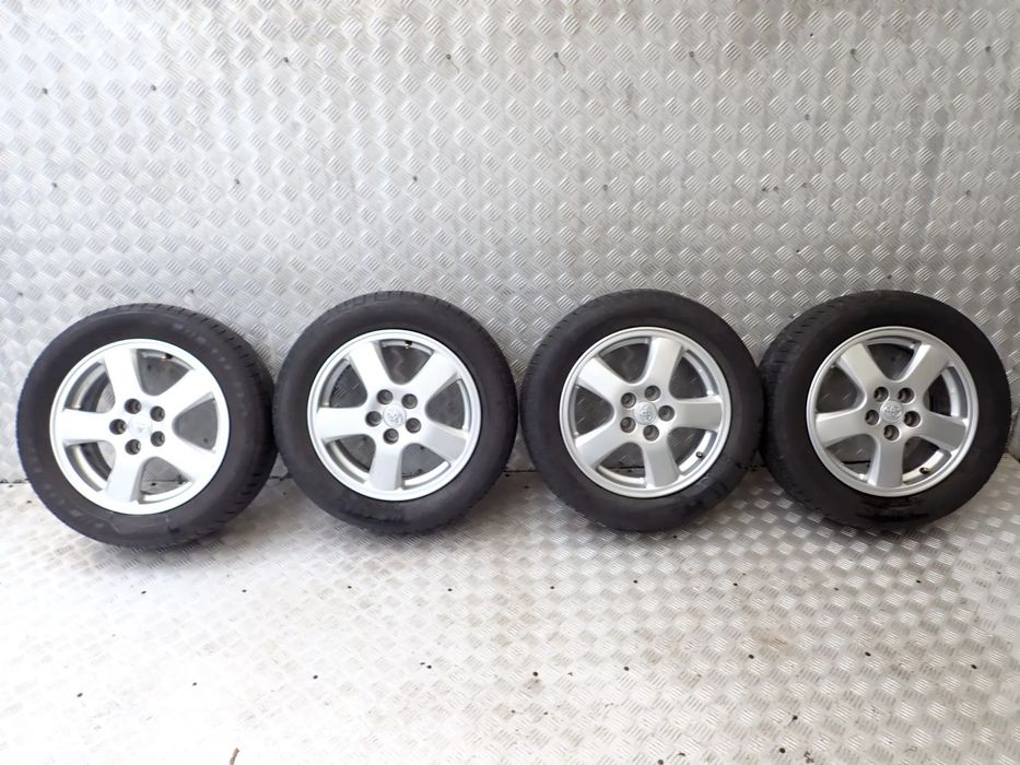 FELGI ALUMINIOWE TOYOTA  6JX15  ET 39  5X100  42611-YY040  Z OPONAMI LATO 195/60/15