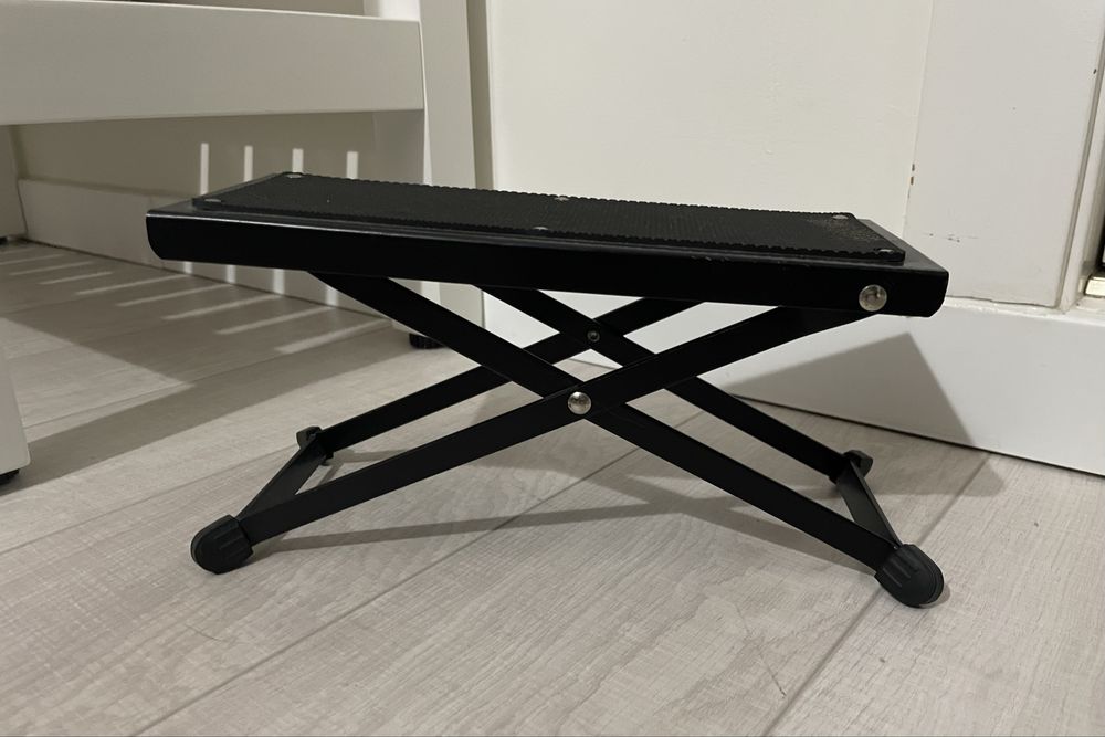 Apoio de pé para tocar guitarra