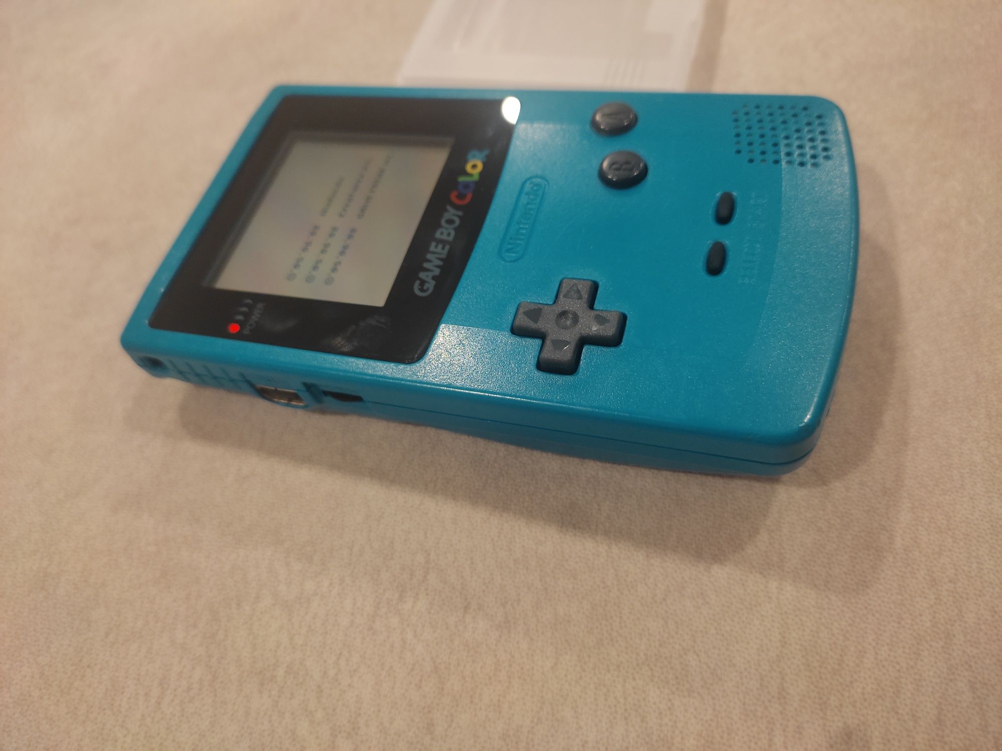 Gameboy Color azul com jogo Pokémon azul