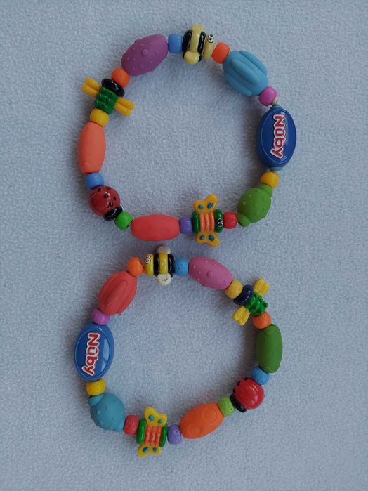Успокаивающий прорезыватель Nuby Bug-a-Loop Teether 3 +