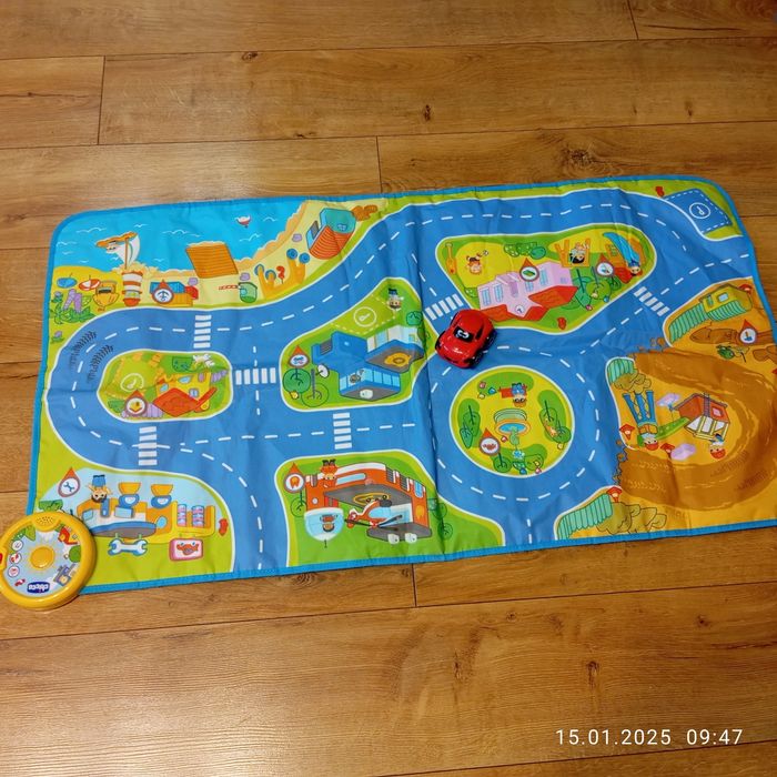 Mata edukacyjna grająca Chico miasto