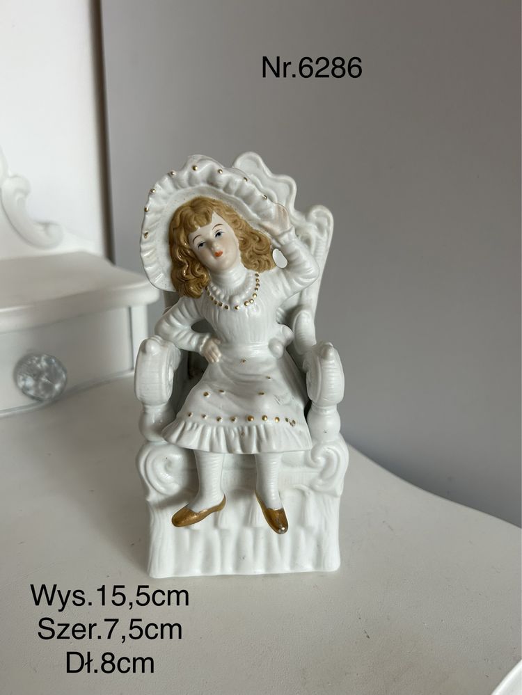 Figurka ceramiczna dziewczynka  na fotelu nr.6286