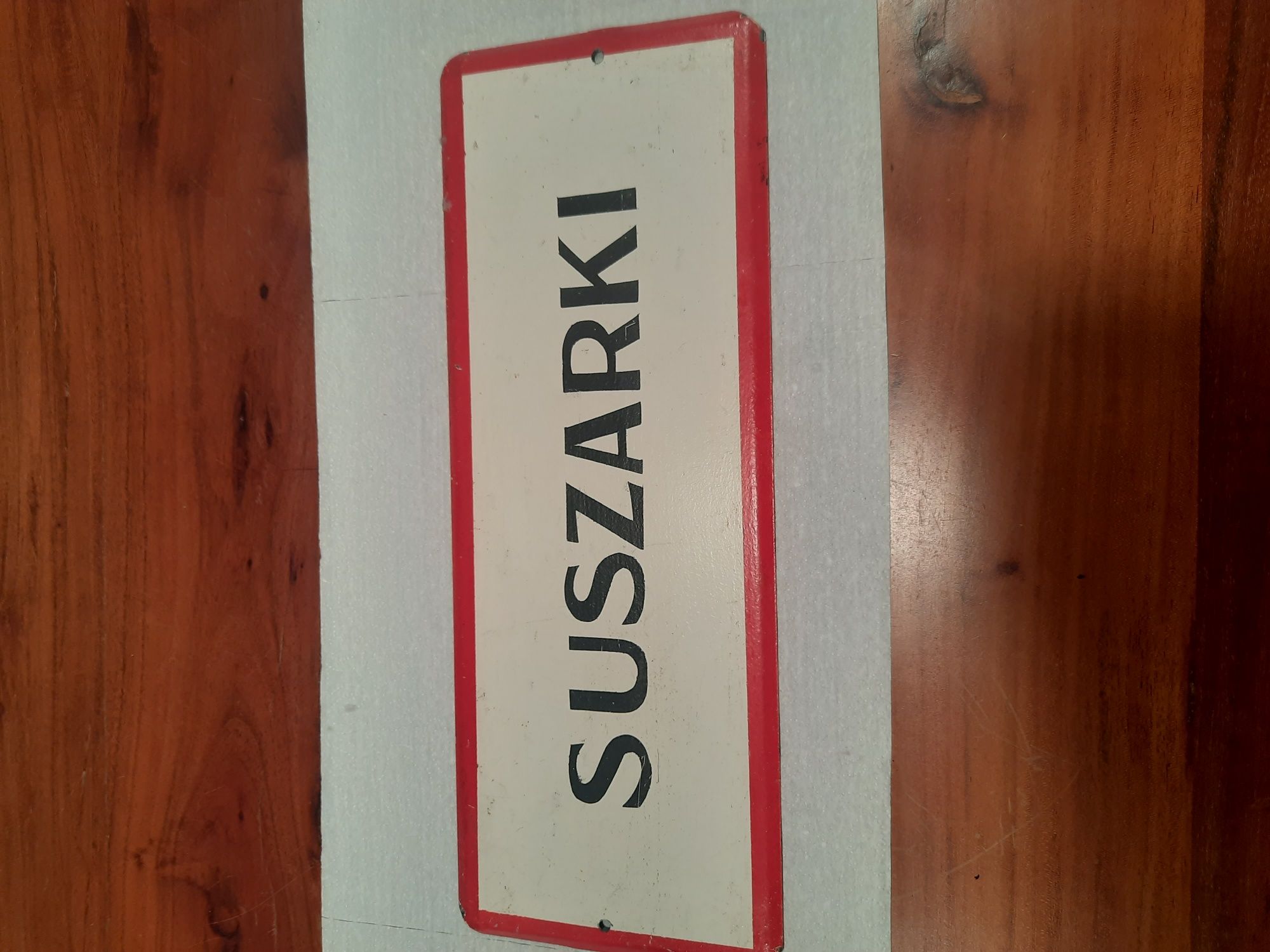 Zabytkowa tablica informacyjna  .Szyld .