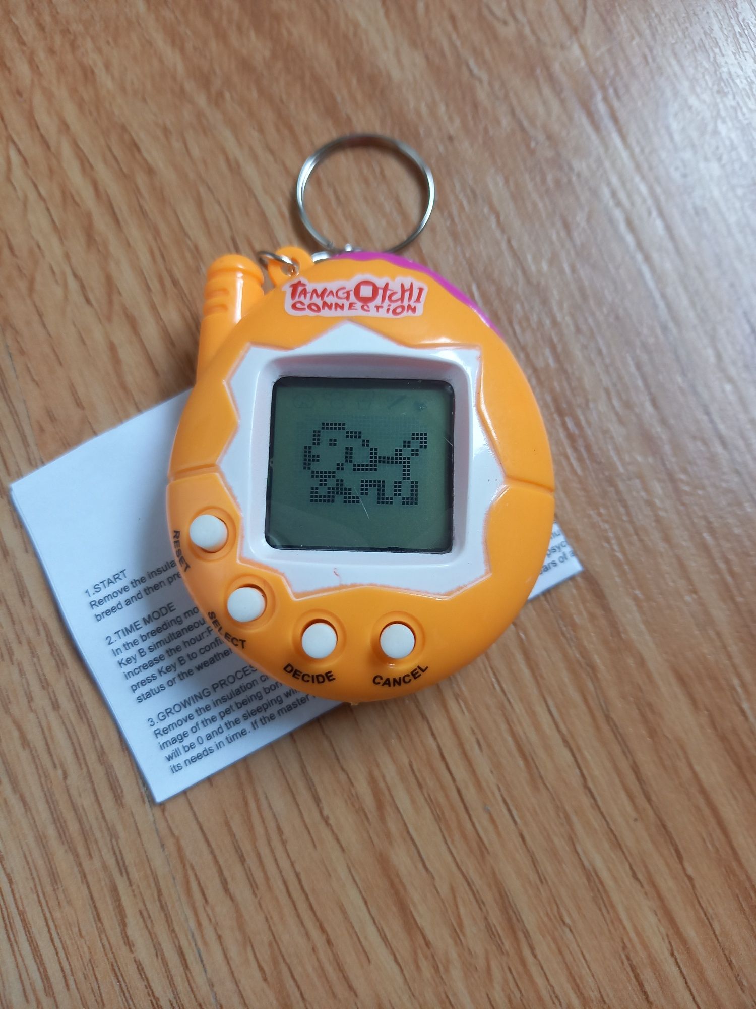 Tamagotchi Laranja ou Azul