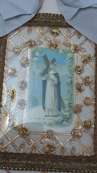 Vendo  Relicário  ou Registo feito à  mão com santa rosa de Lima
