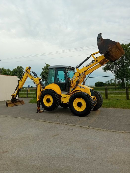 Koparko-ładowarka New Holland B115 cena Brutto 5500 mtg nie case jcb