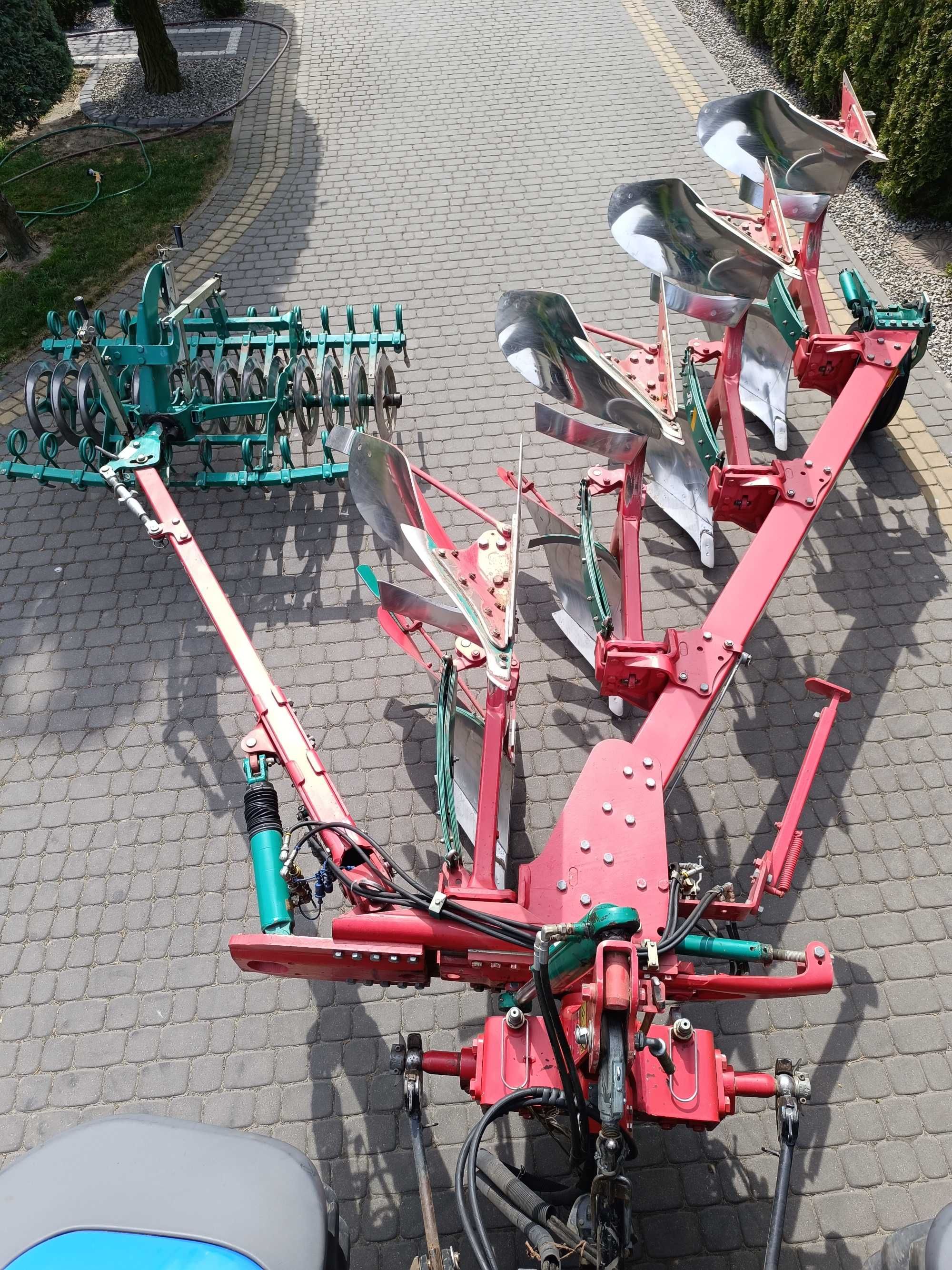 Pług  4- skibowy obrotowy Kverneland EM 100 + Packomat  S