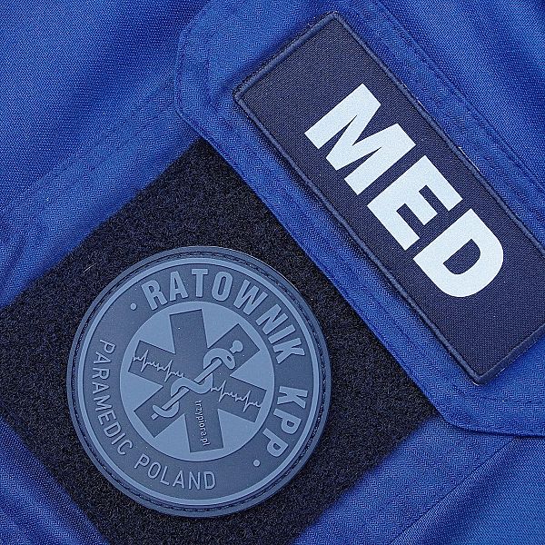 Emblemat dowolny nadruk ODBLASK czarne tło na COMBAT na rzepie 11 x 4