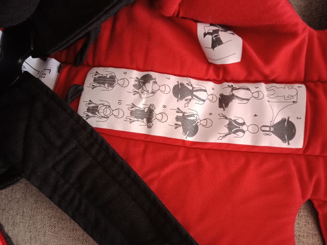 Nosidełko Baby Bjorn  czarne z czerwonymi dodatkami na wzrost od 53 do