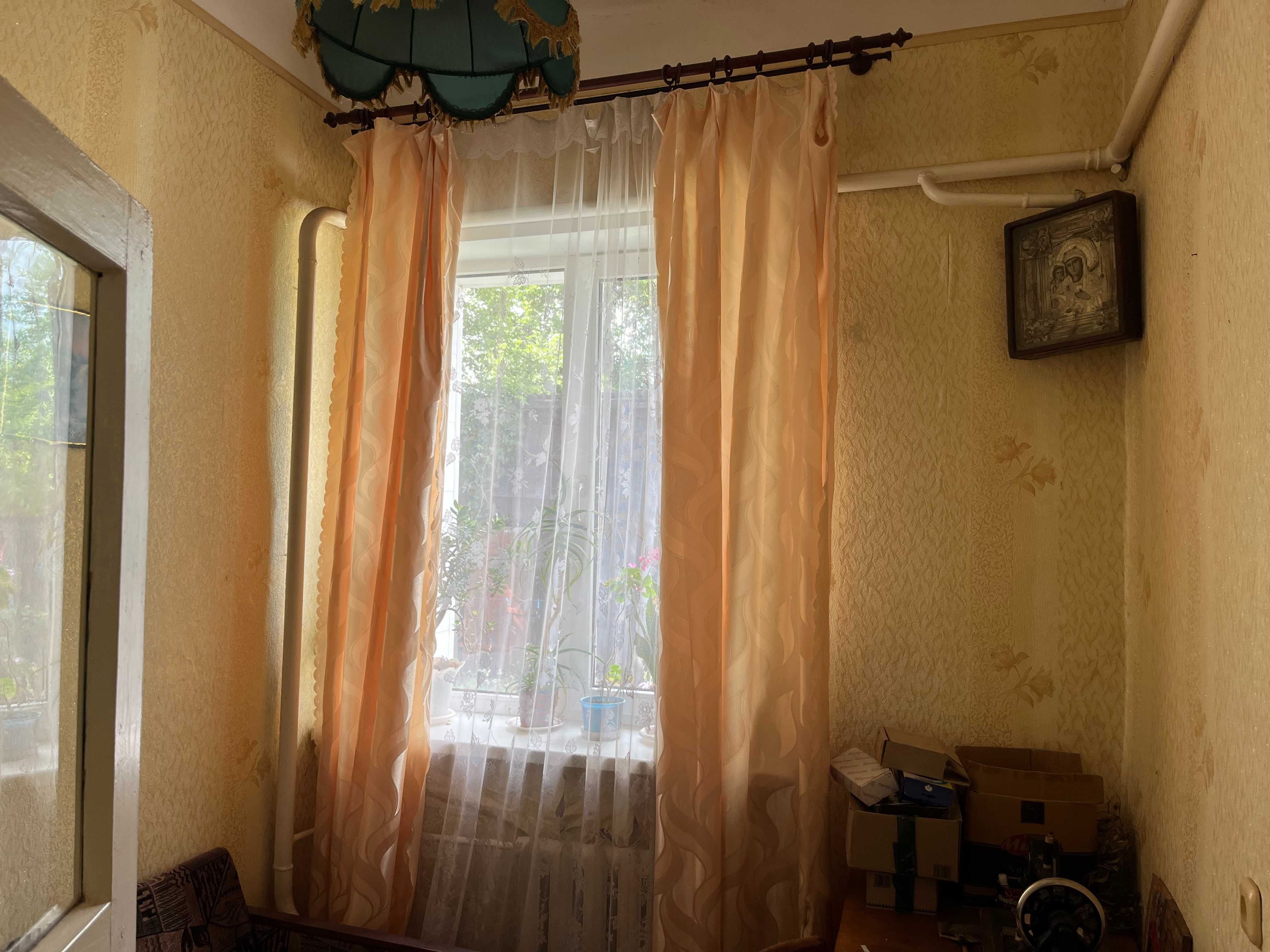 Продам півбудинку,р-н"Порт",вул.Успенсько-Троїцька