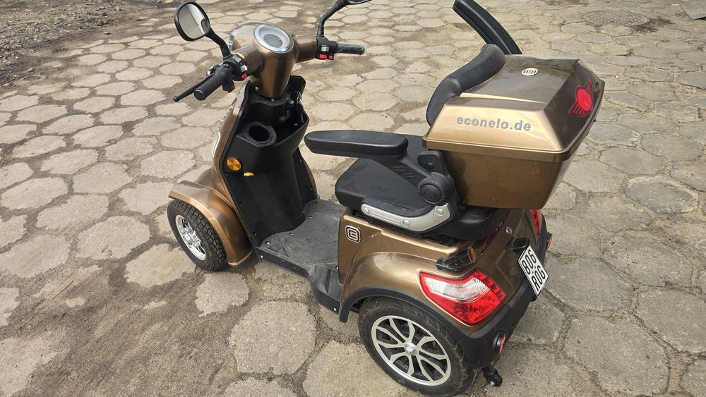 Skuter wózek elektryczny z zadaszeniem