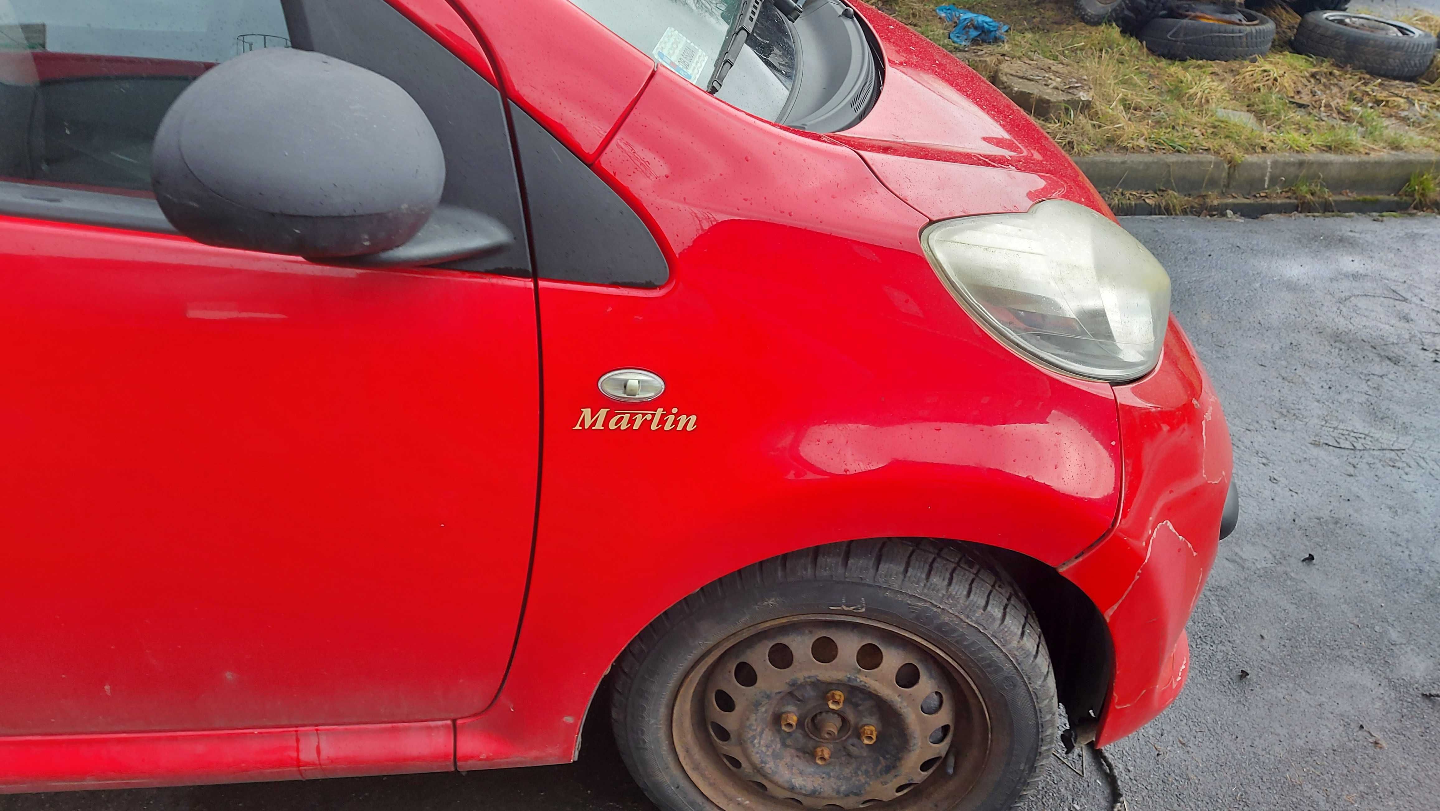 Peugeot 107 KJH błotnik przedni prawy czerwony FV części