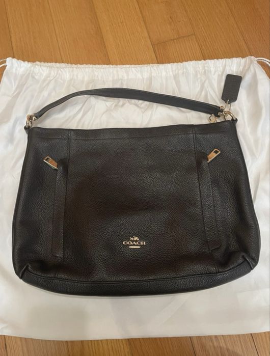 Mala coach nova com saco e alca