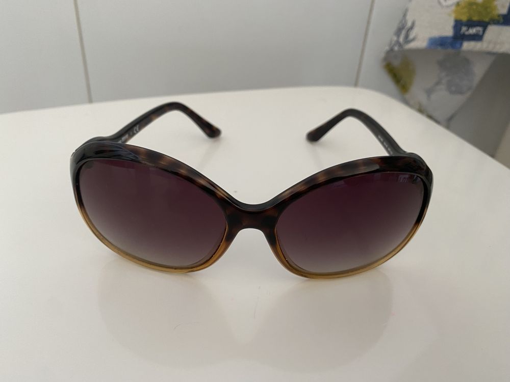 Oculos de sol como novos