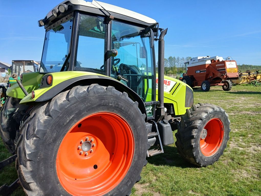 CLAAS Axos 340 cx Tur mx 100, 2009r łyżko krokodyl . 330