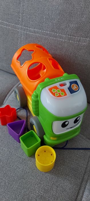 Edukacyjna zabawka muzyczny sorter Fisher-Price do ciągnięcia