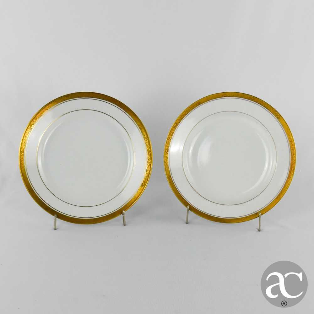 Conjunto de prato fundo e prato raso, porcelana Artibus, friso dourado