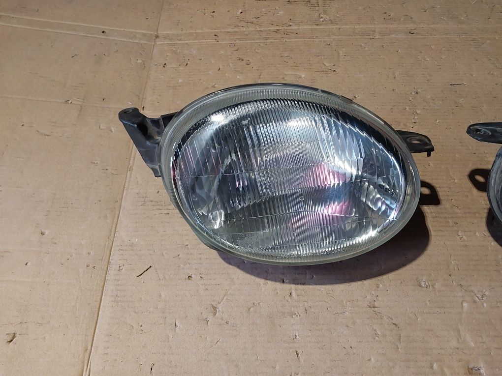 Toyota corolla e 11 lampa przednia przód reflektor prawa lewa prawy