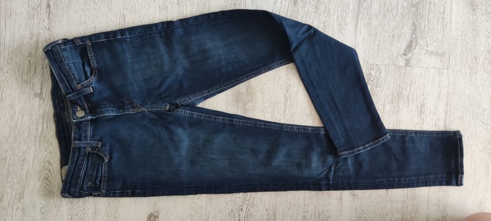 Spodnie jeansy Lee, rozmiar W28, L31.