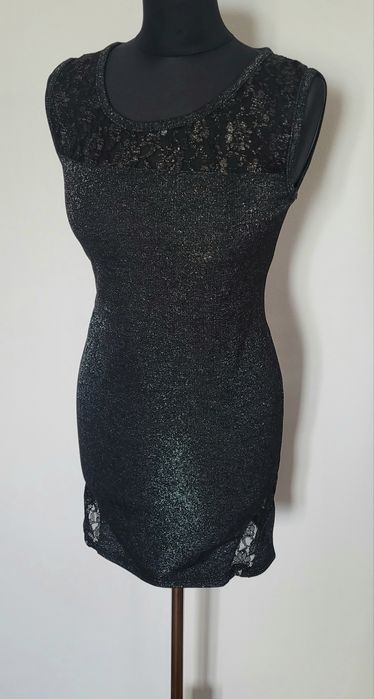 Nowa przepiękna dopasowana sukienka damska bez rękawów mieniąca sie