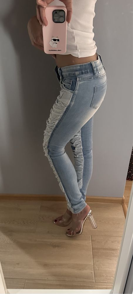 Spodnie Jeansy przecierane dziury / Rozm. S