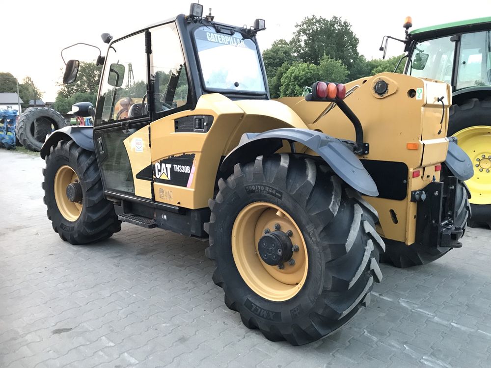 Ładowarka teleskopowam Cat TH 330 B klima 145 km z Niemiec JCB Manitou