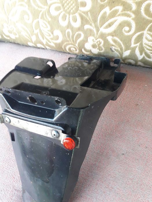 Заднє крило скутера