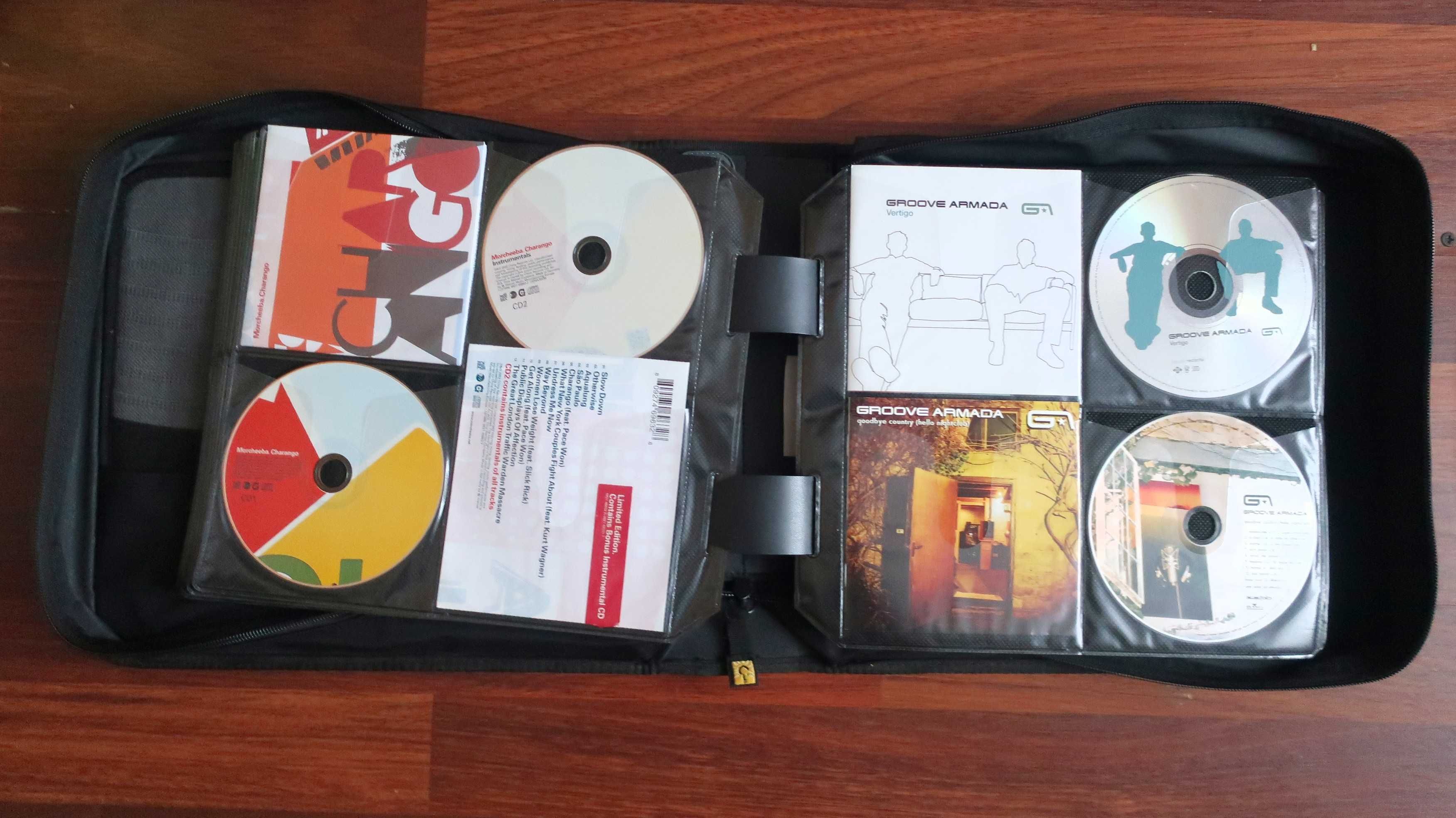 Płyty CD (ponad 100 sztuk), stan doskonały (jak nowe), z walizką.