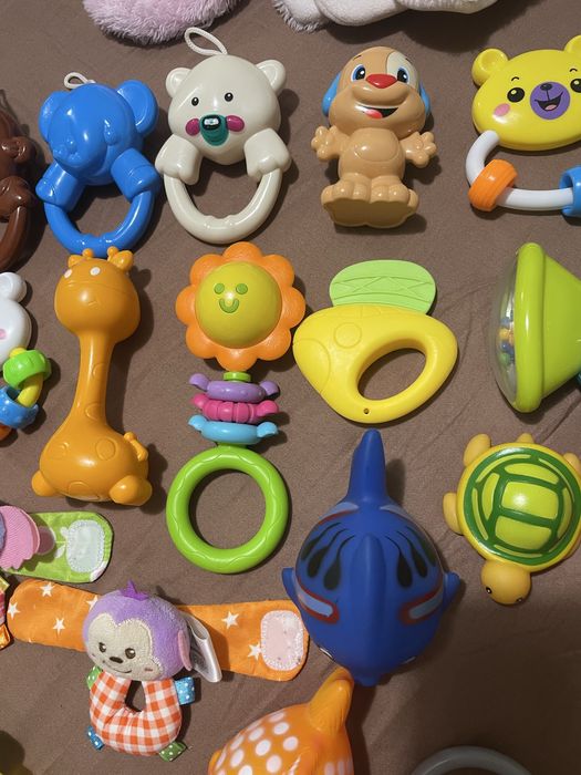 Іграшки для новонароджених. Гризунці. Брязкальця. Кліпса для соски.