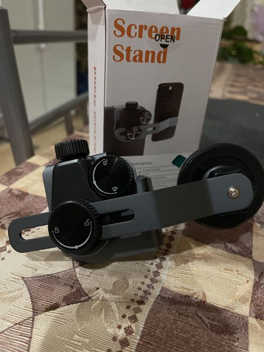 Tesla y , 3 . Тримач для телефону