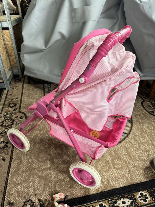 Дитяча коляска іграшкова