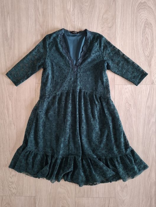 Koronkowa zielona sukienka