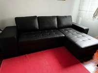 Sofá cama em L para venda. Este sofá trás 2 bancos.