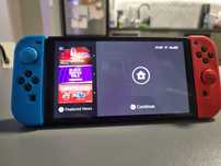Switch OLED + akcesoria i gry