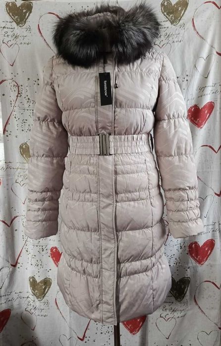 Новий бежевий пуховик