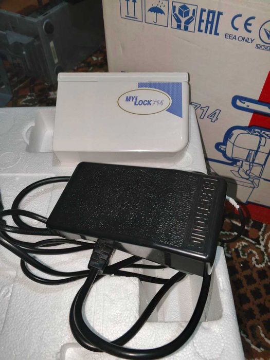 Оверлок четырёх ниточный Janome