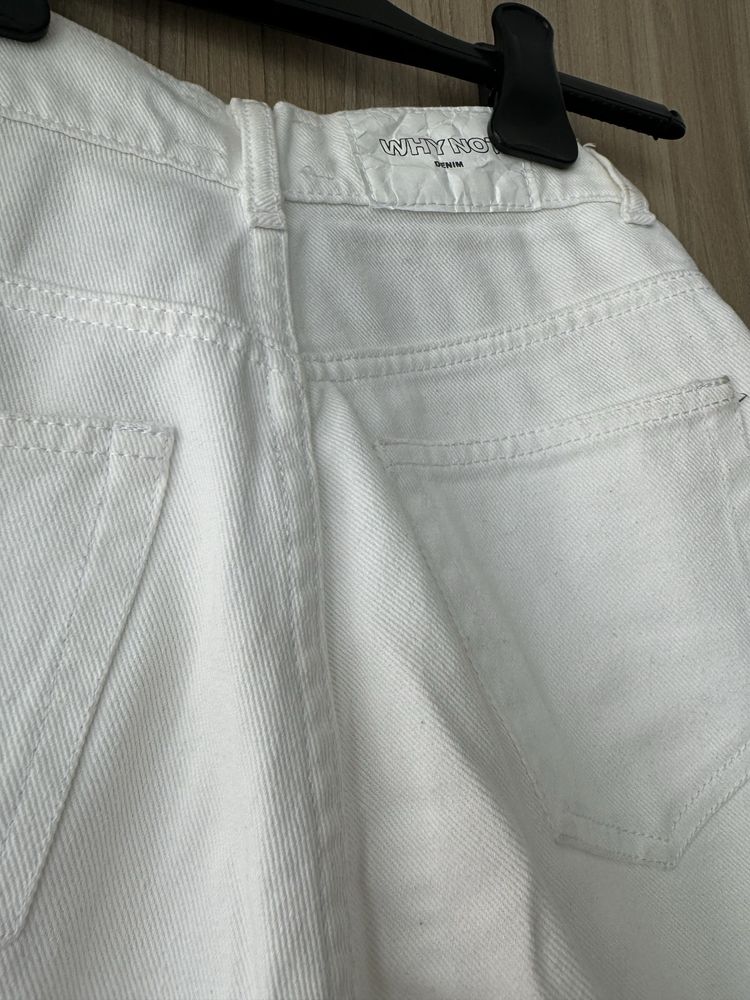 білі джинси з розрізами 36 розмір