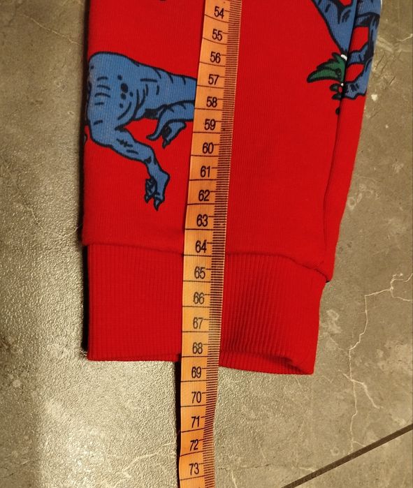 Spodnie chłopięce z dinozaurami motyw świąteczny