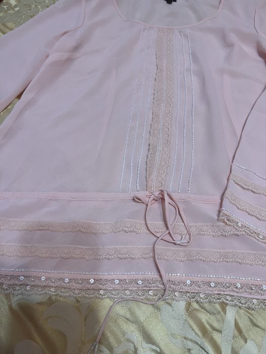 Подарую блузку Xl