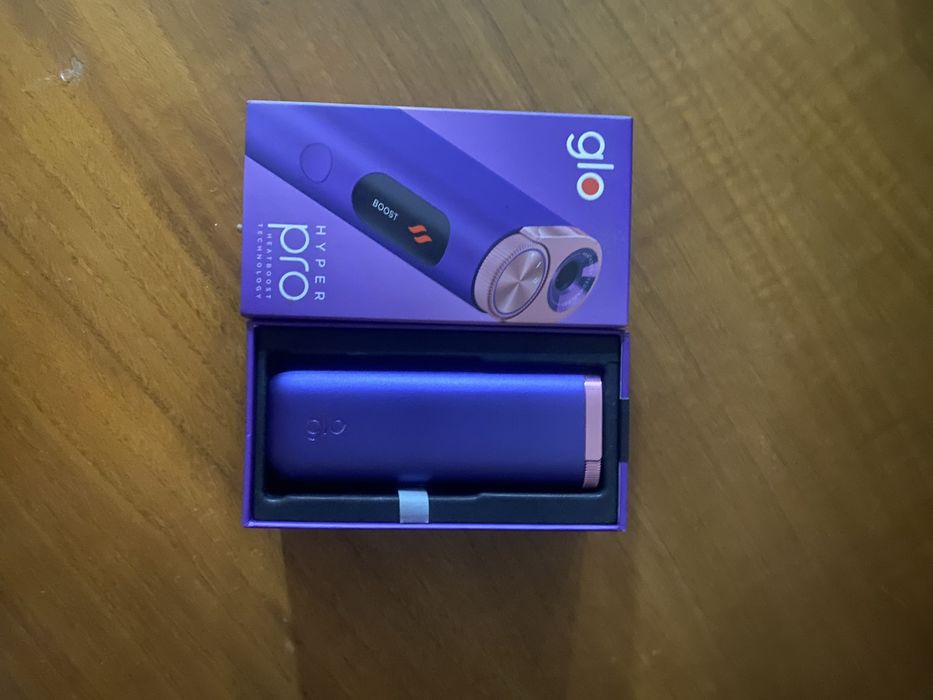 Máquina Glo em caixa com carregador como nova