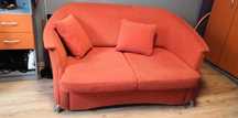 sofa rozkładana, intensywny pomarańcz.