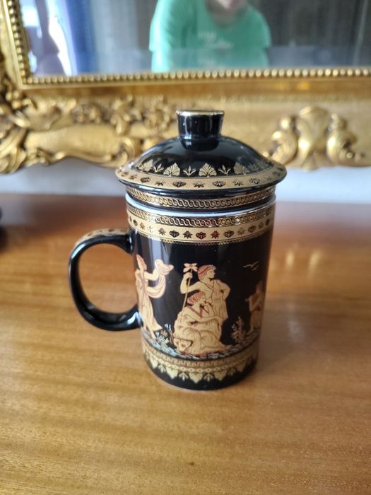 Elegancki kubek z zaparzaczem porcelana