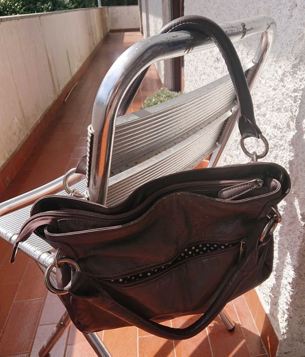 Mala castanha em pele