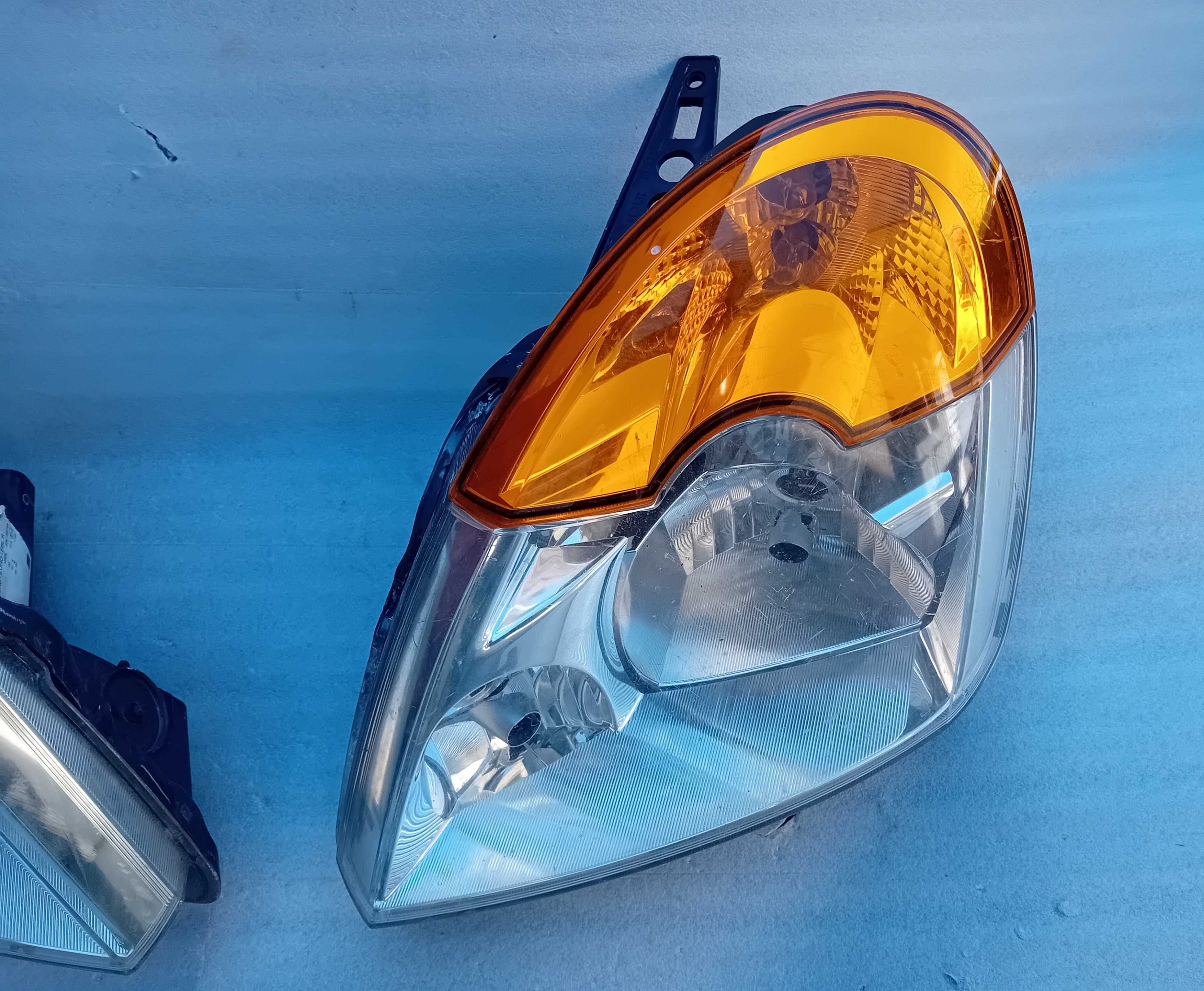 Renault Modus reflektory, lampy przednie.