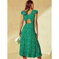 Зелене плаття з оригінальним вирізом на спинці