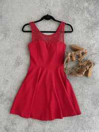 Piękna elegancka czerwona sukienka z kokardą z tyłu - rozm XS\S