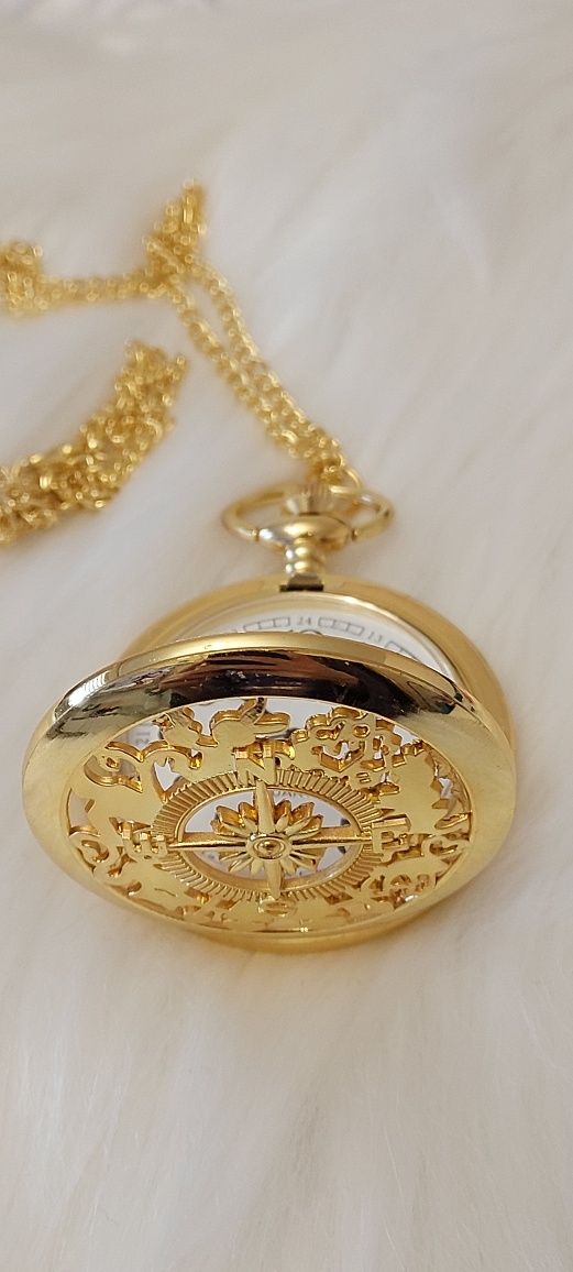 Złoty zegarek kieszonkowy z łańcuszkiem