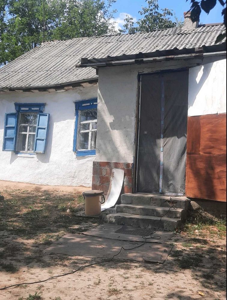 Продам ділянку с будинком