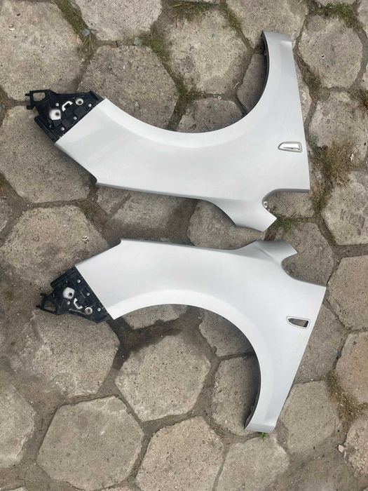 Opel Astra J Z176 błotnik przedni lewy / prawy