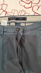 Calças da marca C&A modelo CANDA CHINO